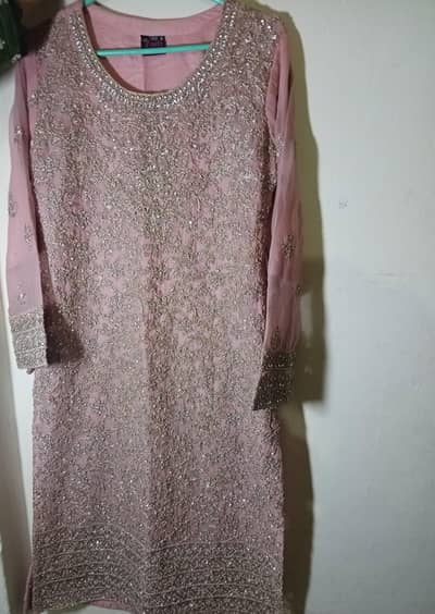 elegent dusty pink suit with heavy embriodery