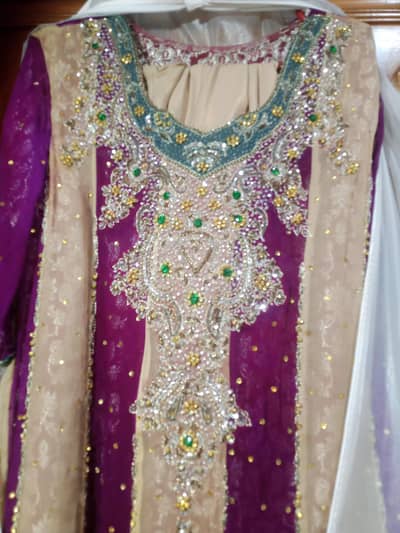 heavy embroidery frock , beautiful mehroon ND golden