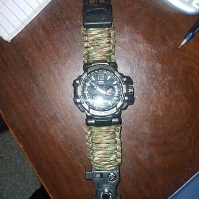 Yuzez G3 survival watch. 6 in 1. Fire starter, Paracode,Whistle,Compas
