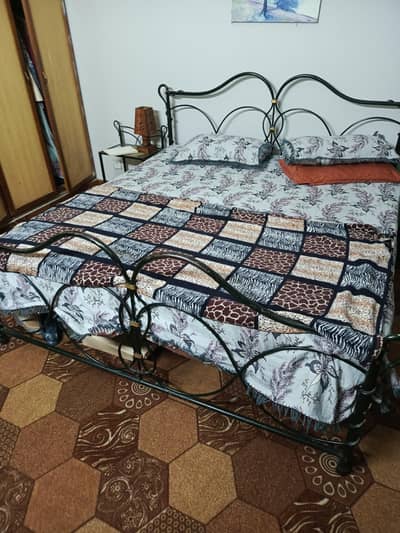 iron bed for sale with w side tables without matress