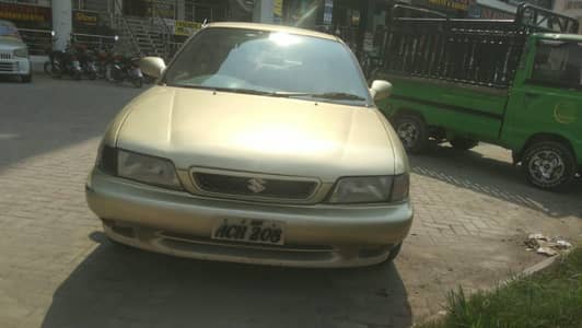 Suzuki Baleno 2002 Model Golden Colour – Punjab Registered