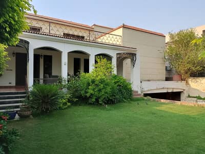 2 Kanal Used Modern Design Most Beautiful 9-Bedroom Full Basement Bungalow For Sale At Prime Location Of Dha Lahore Near To Park Masjid & Commercial Market .
