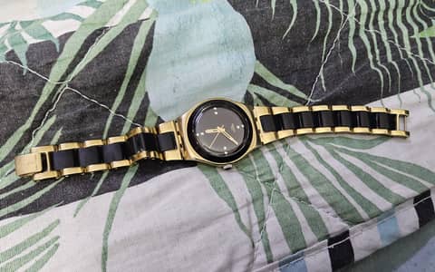 swatch watch yellow pearl  black dial two tone watchvfor sale