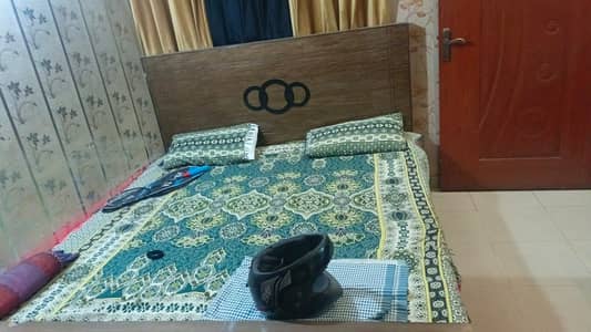 bed, dressing and a side table
