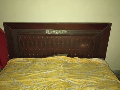 double bed wooden queen size with side tables good condition
