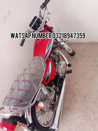 Honda 125 cc brass Rockstar 2015 model Lahore ka number laga hua