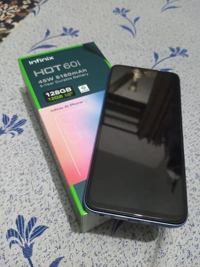 Infinix HOT 60i. . FULL WARRANTY. . 6gb 128gb.