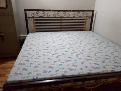Iron bed without mattress