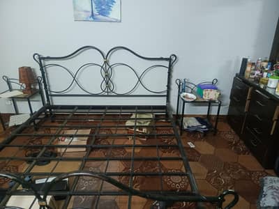 iron bed for sale with w side tables without matress
