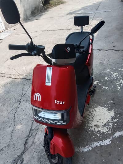 saig N300 electric scooty