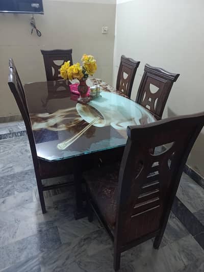 Glass top dining table