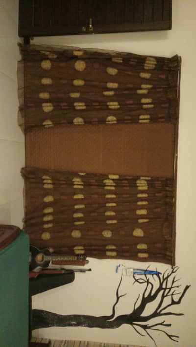Brown silk blinds and organza sheer