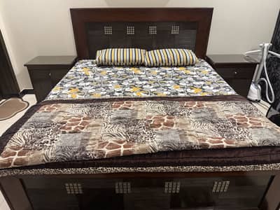 Wooden bed with side tables and dressing table and stool