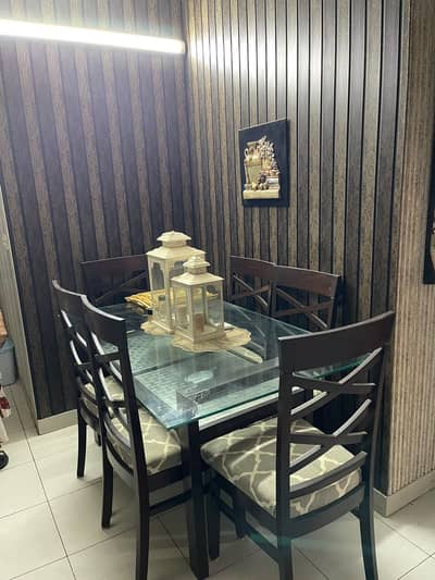 6 seater dinning table with glass Top and solid wood chairs