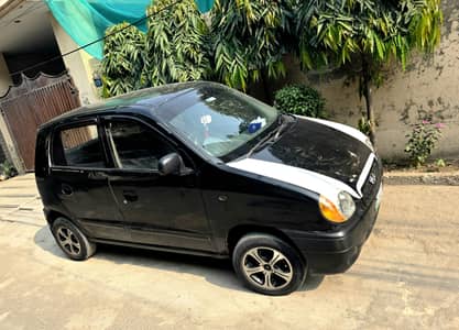 Santro 2005 better than alto cultus mehran