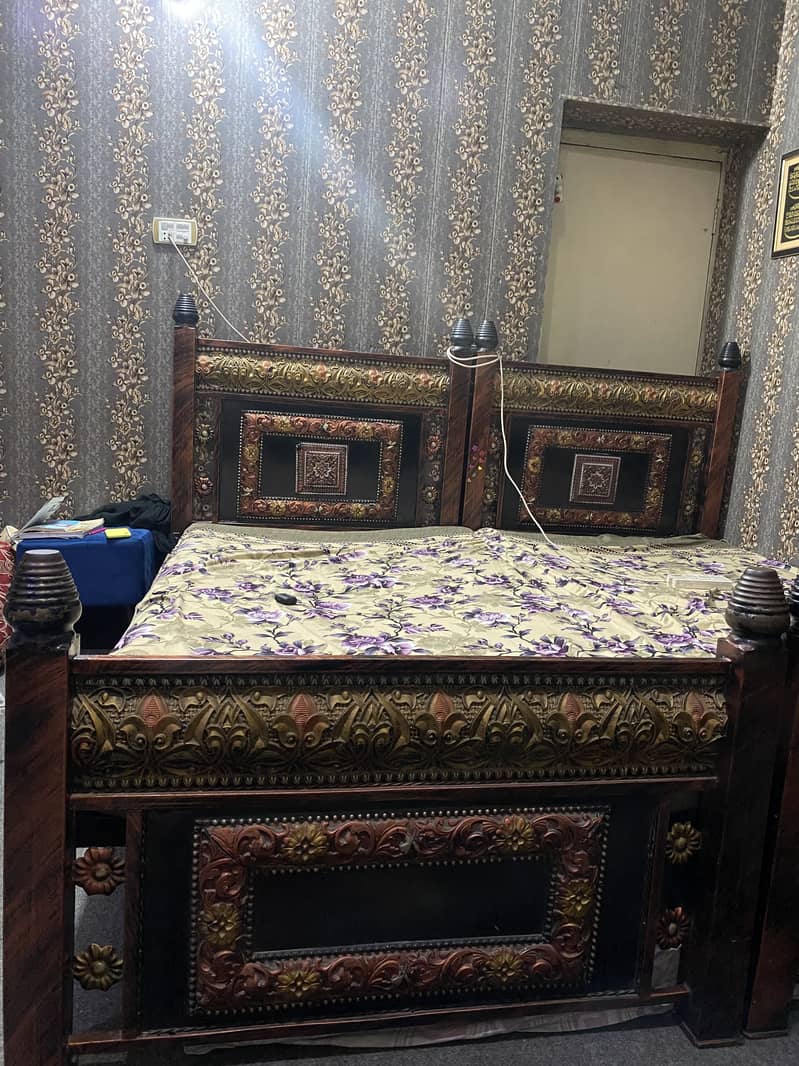 2 single iron beds 1