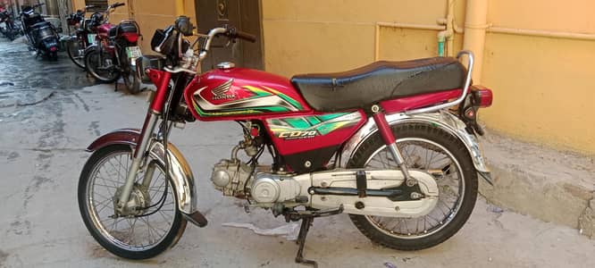 Honda cd70 2022 model Lahore number ake 7049 one hand used