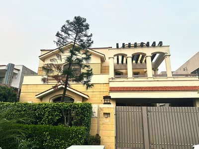 SYED BROTHERS PROUDLY OFFERS: 1-Kanal Elegant And Fully Maintained Bungalow Is Available In The Best Block Of DHA Lahore.