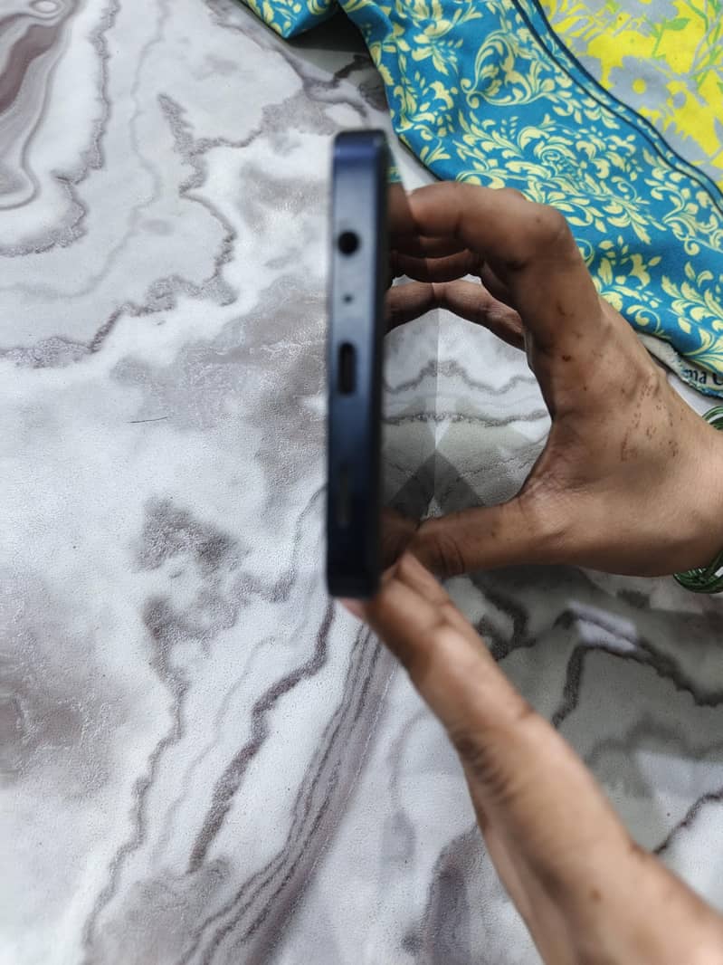 Samsung Mobile A06 1