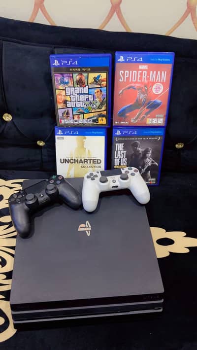PS4 Pro Full Set for Sale | 2 Controllers + 4 Games + Dual Charger