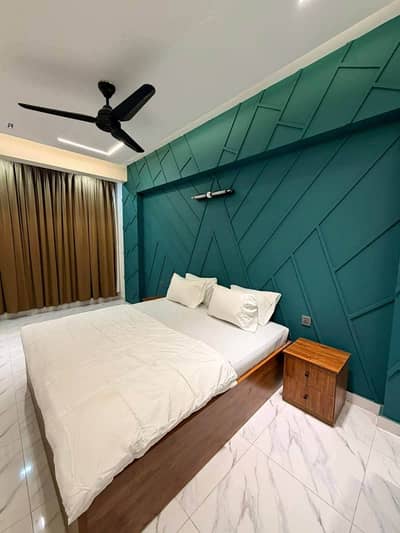 Daily Basis Apartment & Rooms Per day Perweek Short stay Available in E-11 Islamabad