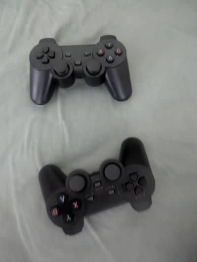 Game stick liye with 2 controllers.