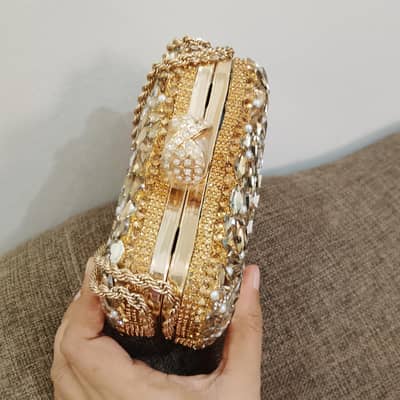 beautiful clutch both sides stones work