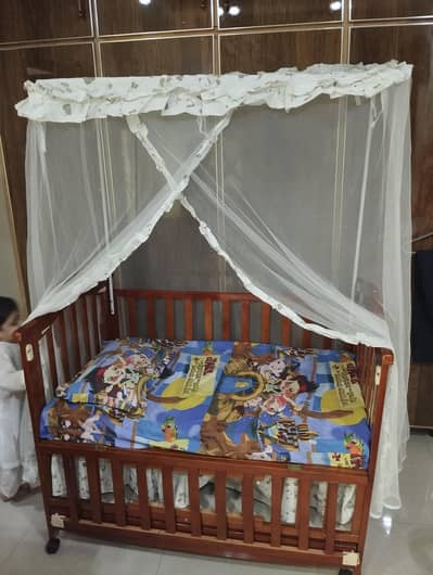 baby cot along with mattress
