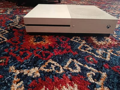 XBOX ONE S 1TB WITH TWO CONTROLLERS AND TWO AAA GAMES.