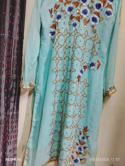 women's luxury sky blue three piece salwar kameez with hand work .