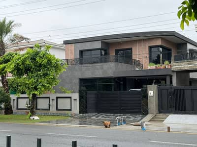 One Kanal Brand New Luxury Ultra-Modern Design Most Beautiful Owner Build Full Basement Bungalow For Sale At Prime Location Of DHA Lahore Near To Park Masjid & Commercial Market.