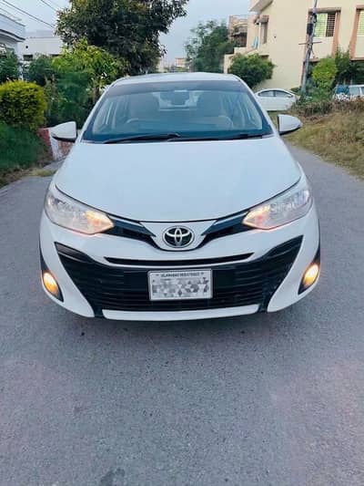 Yaris ATIV 2021, Islamabad registered, white Color, Total genuine