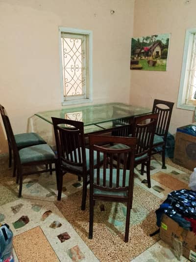 Glass Dinning Table with 6 chairs for sale