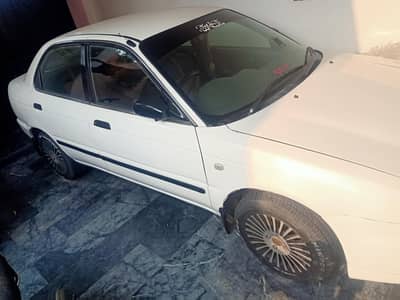 Suzuki Baleno 2004.     phone number 03007622552