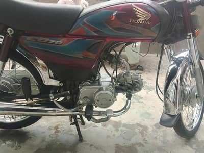 Honda 70 red colour in good condition
