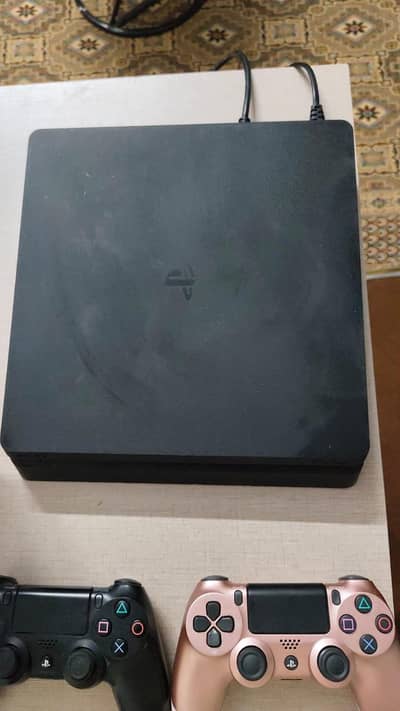PS4 Slim 500GB with 2 Controllers + 3 Games | Complete Box