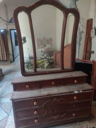 Dressing table brown wood colour with attached mirror for sale
