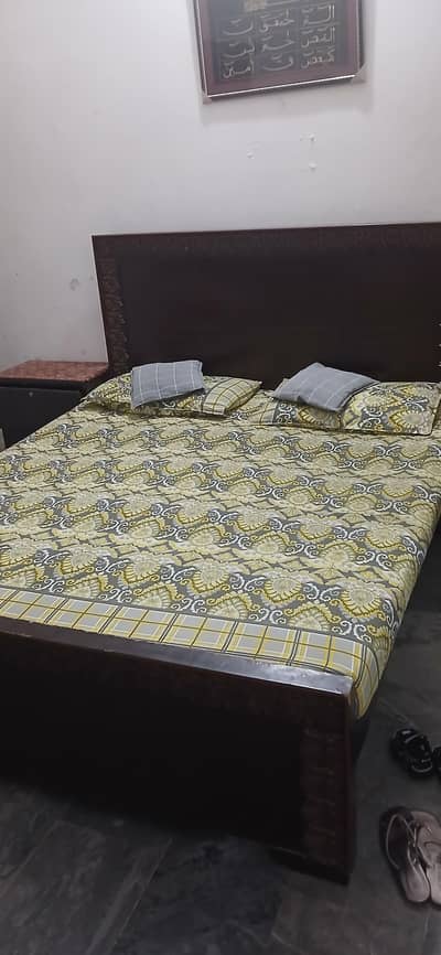bed with side tables and dressing