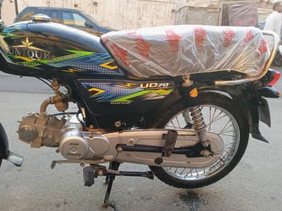 unique bike 2024 model 12 month Karachi num total km used 3099