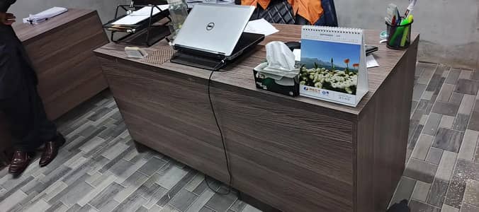 Office table with dreaws cabnet and other