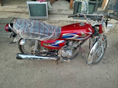 selling honda 125 Karachi registration golden number