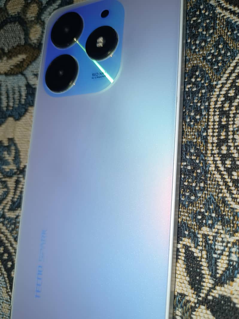 Tecno Spark 10 4