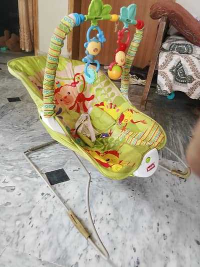 baby bouncer and baby cot
