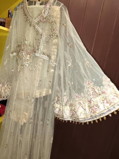 fancy dress (net) dress by golden zari by shuja