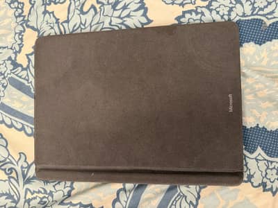 Surface pro X SQ1 chip and 128GB storage (charger included)