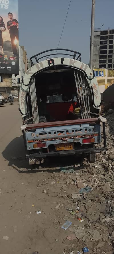 pick and drop school Suzuki with child route saddar to defence