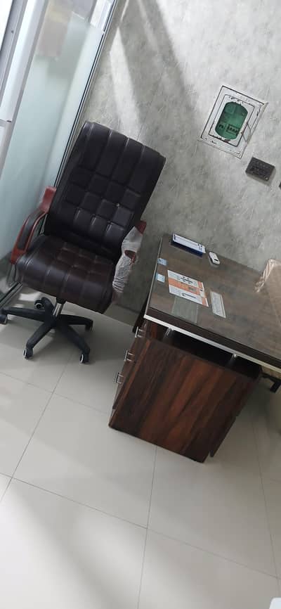 office table and boss chair