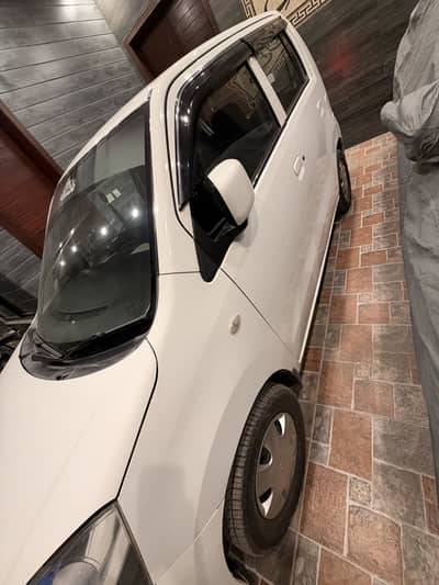 Suzuki Wagon R vXL total genuine.