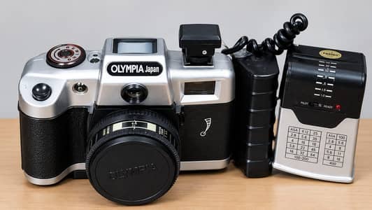 Vintage Olympia Japan DL2000A with complete set with carrying bag