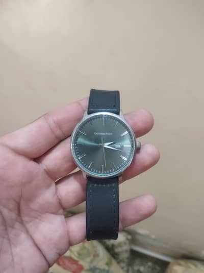 Original Universe point made in P. R. C leather strap